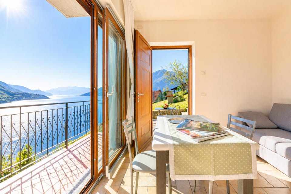 Patio, Day, Natural landscape, View (from property/room), Balcony/Terrace, Living room, Seating area, Dining area, Lake view, Mountain view
