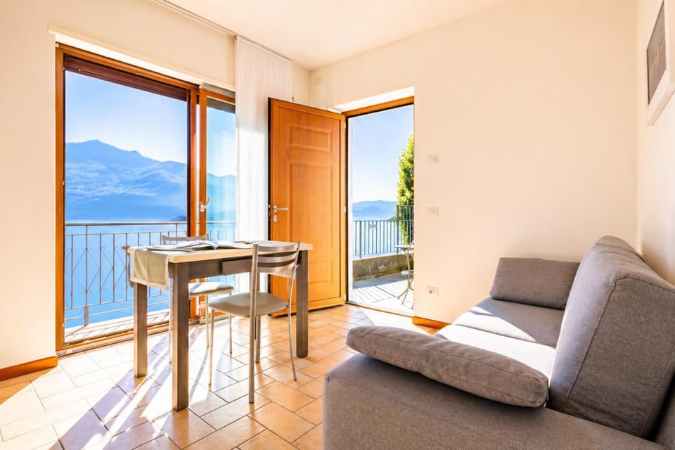 Day, Natural landscape, View (from property/room), Balcony/Terrace, Living room, Seating area, Dining area, Lake view, Mountain view