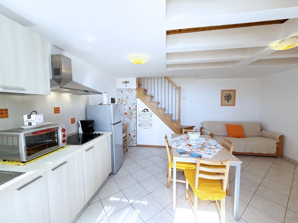 Kitchen or kitchenette, Living room, Seating area, Dining area, stove