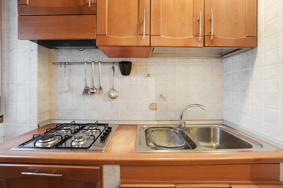Kitchen or kitchenette, stove