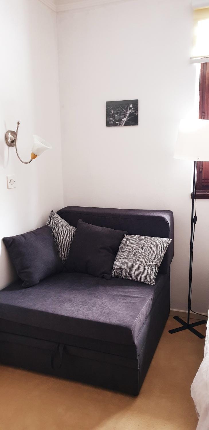 Bed, Living room, Seating area