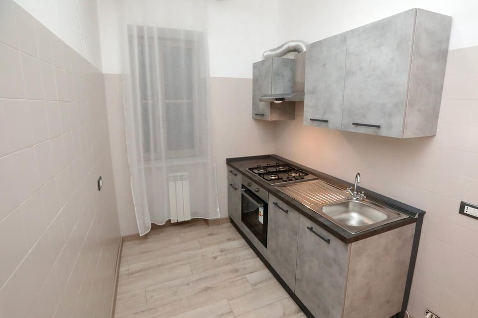 Kitchen or kitchenette, oven, stove