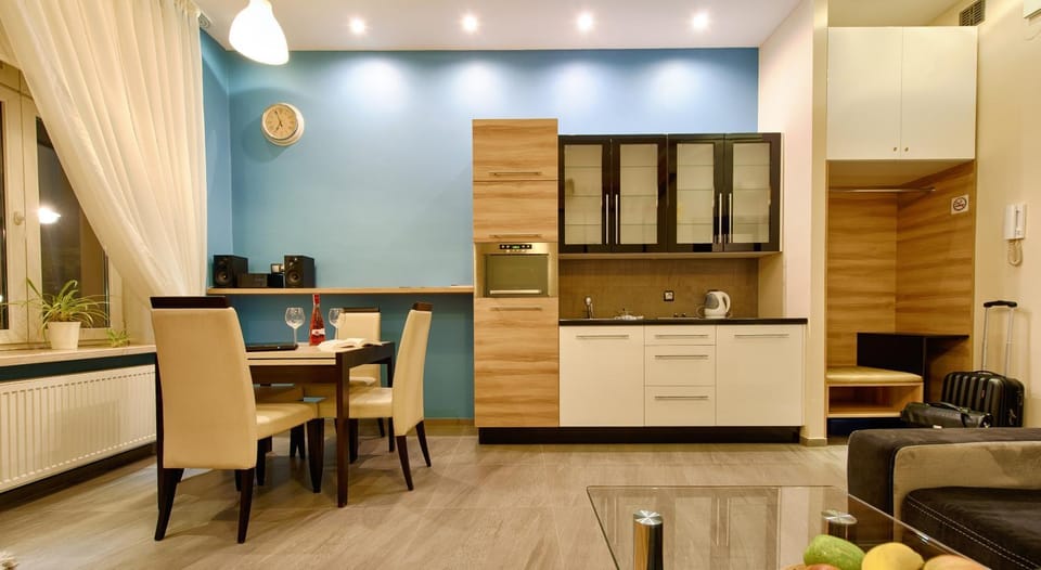 Dining area, minibar, oven, stove