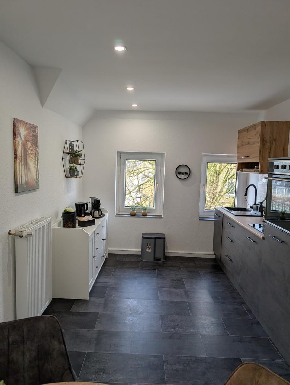 Kitchen or kitchenette, dishwasher, oven, stove