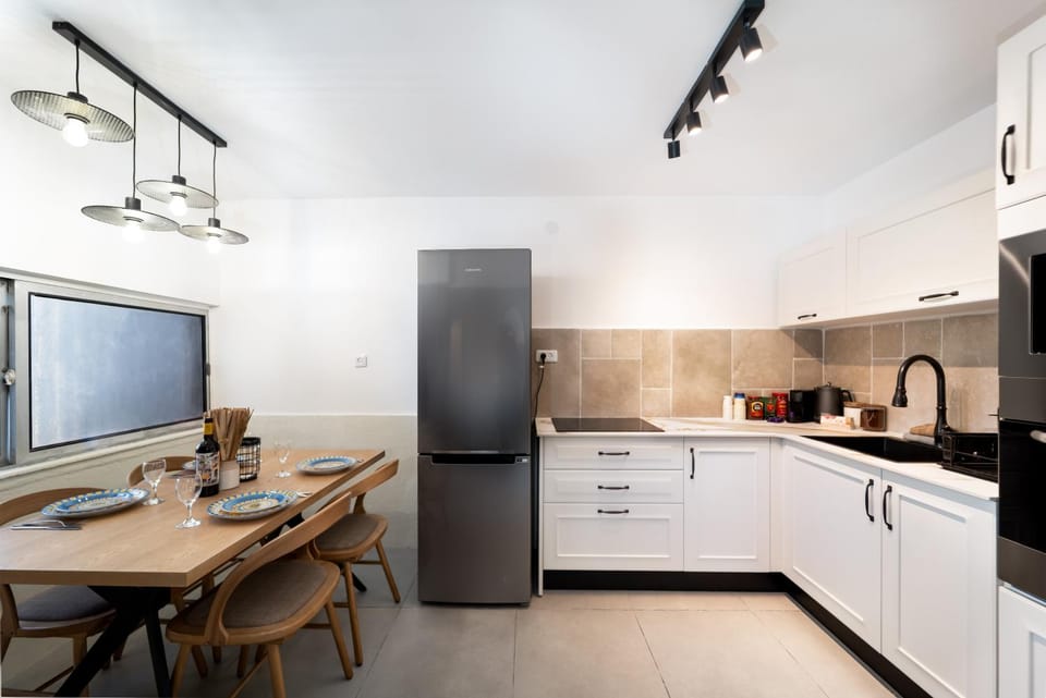 Dining area, dishwasher, stove, toaster