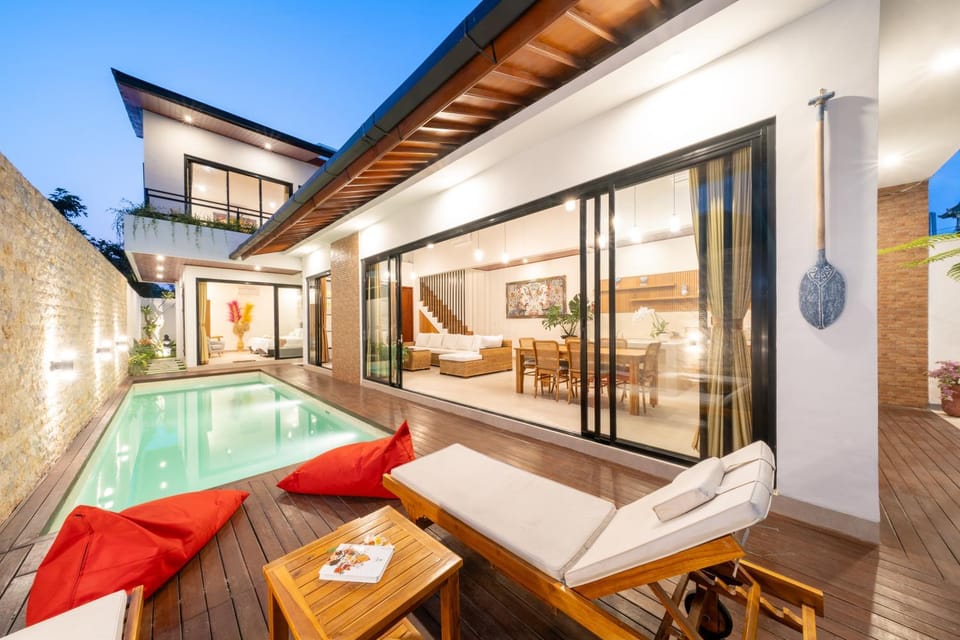 Patio, Bed, Natural landscape, Living room, Seating area, Pool view, Swimming pool, sunbed