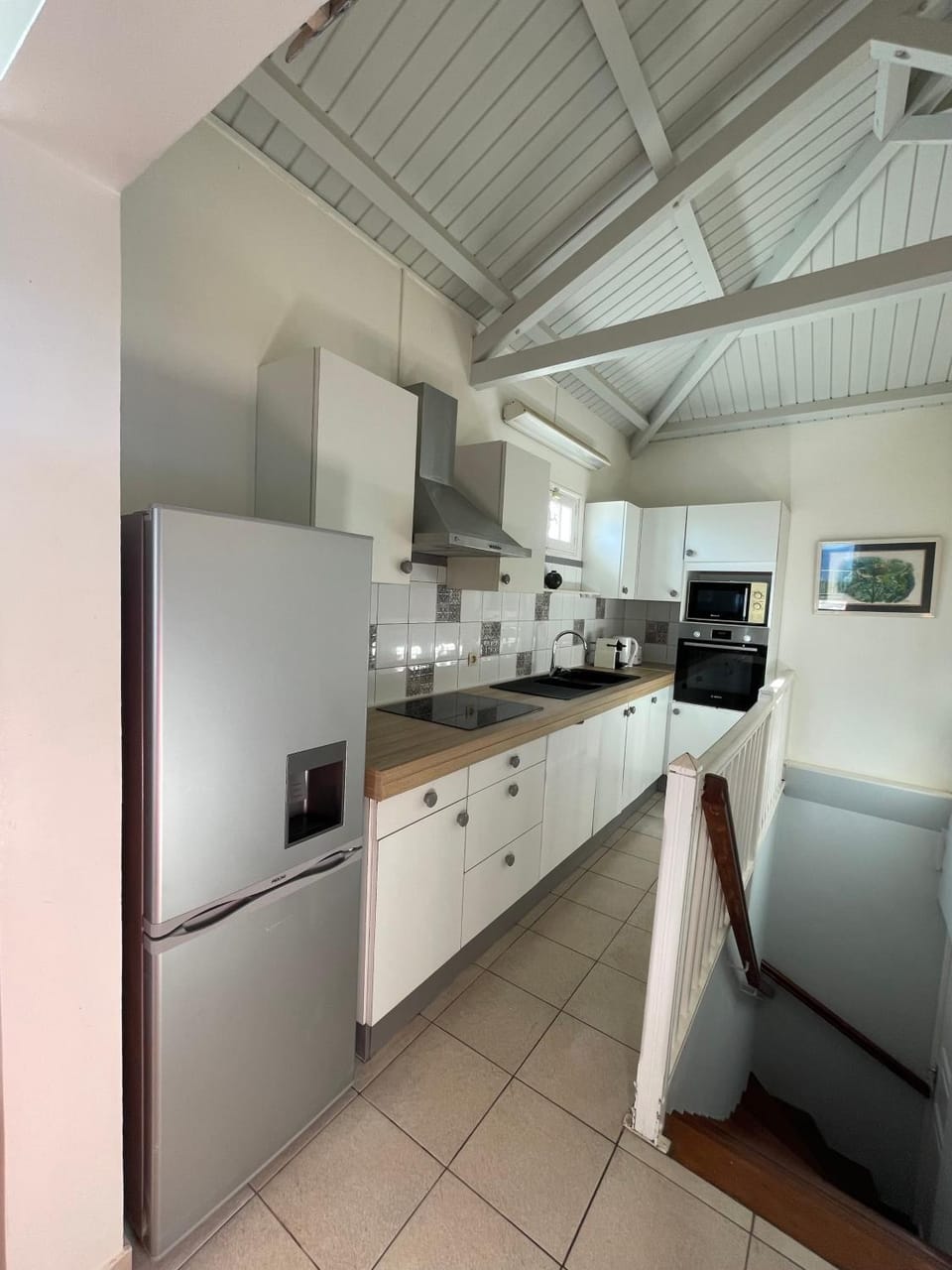 Kitchen or kitchenette, dishwasher, oven, stove, toaster