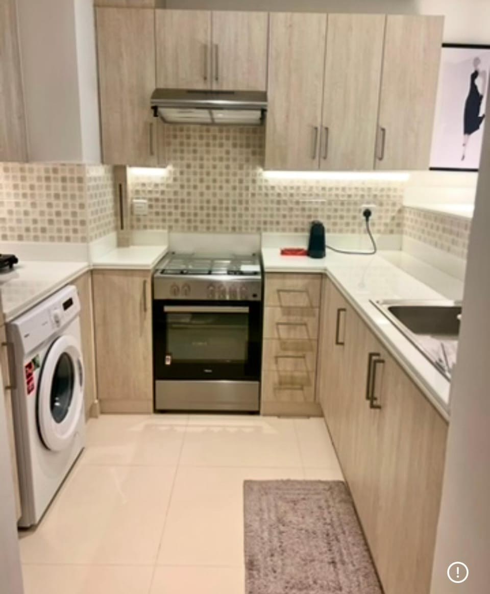 Kitchen or kitchenette, washing machine