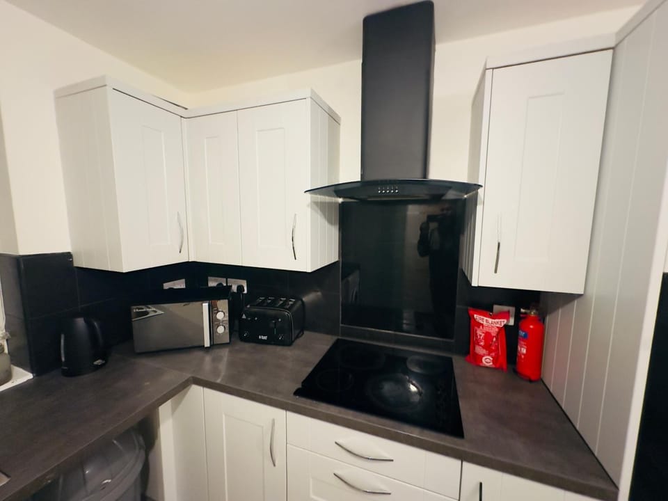 Kitchen or kitchenette, stove