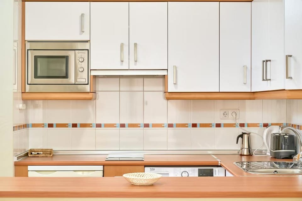 Kitchen or kitchenette, stove, toaster