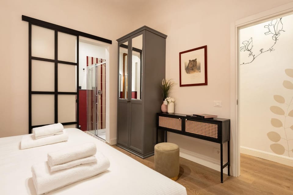 Bed, Bathroom, Photo of the whole room, Decorative detail, Decorative detail, Bedroom, heating, heating, locker, towels, wardrobe, air conditioner, air conditioner