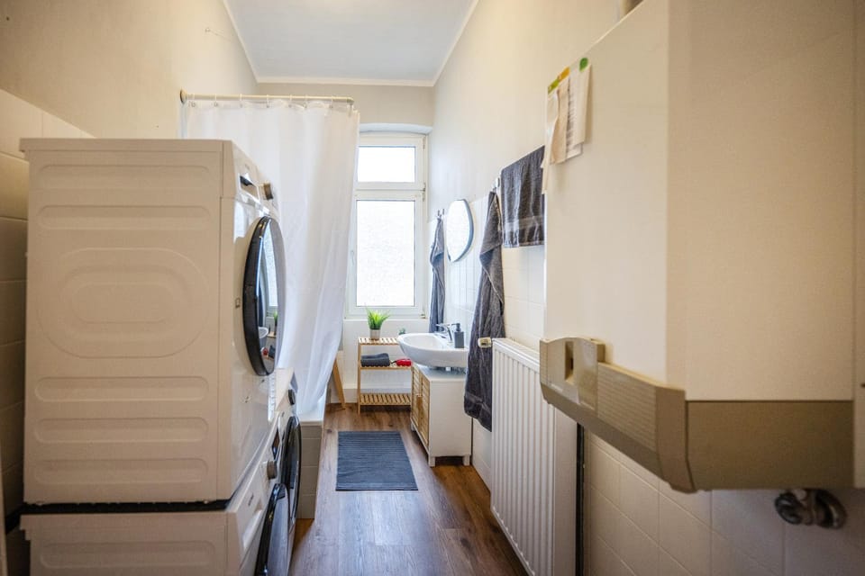 Bathroom, Photo of the whole room, hair dryier, washing machine, dryer