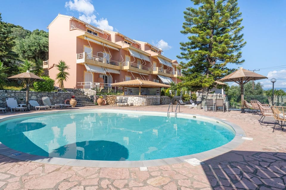 Property building, Living room, Swimming pool