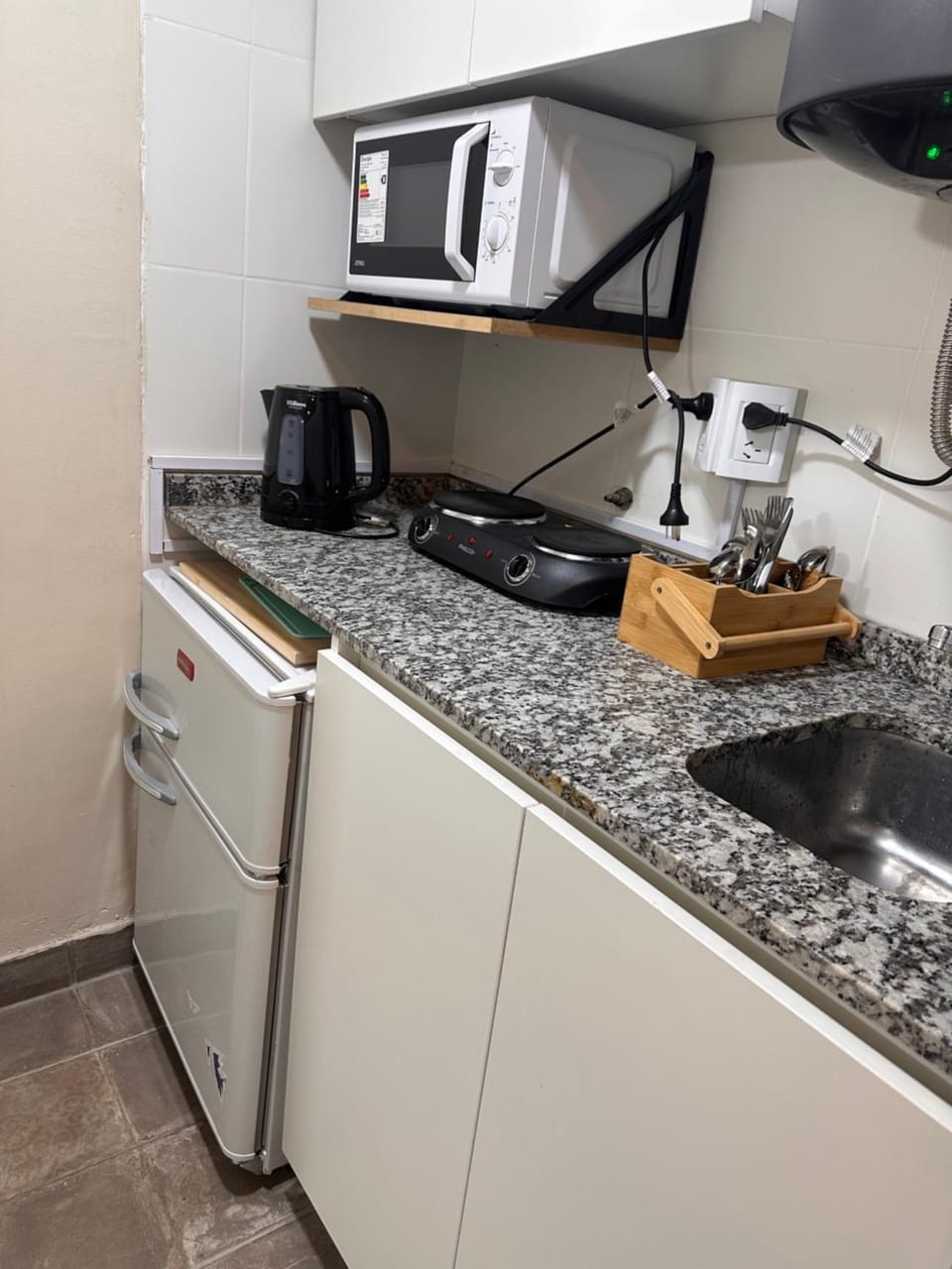 Kitchen or kitchenette, stove, toaster