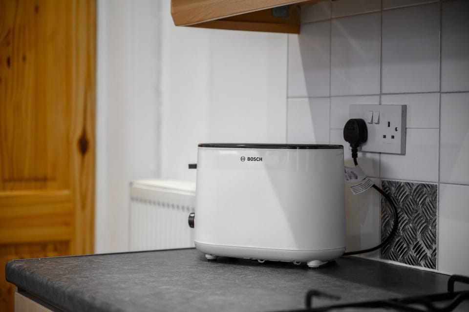 Kitchen or kitchenette, toaster