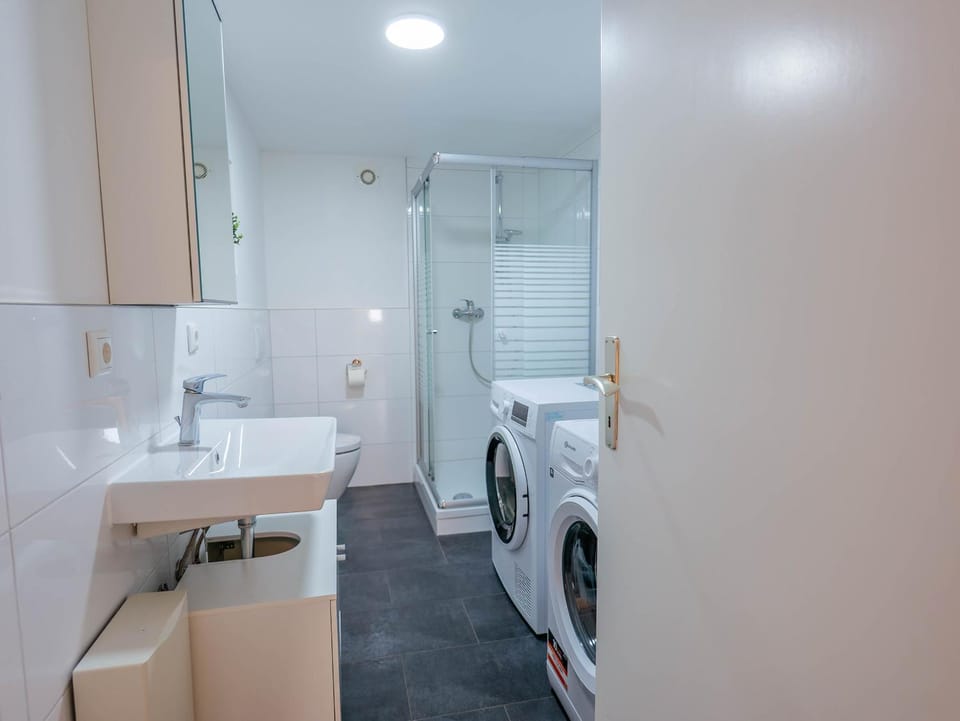 Bathroom, washing machine, dryer