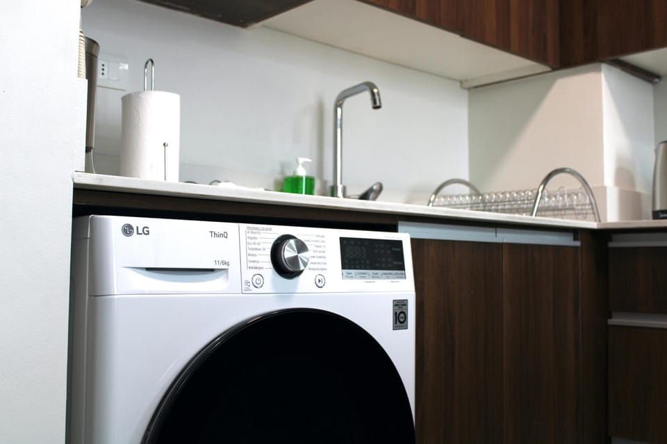Kitchen or kitchenette, washing machine