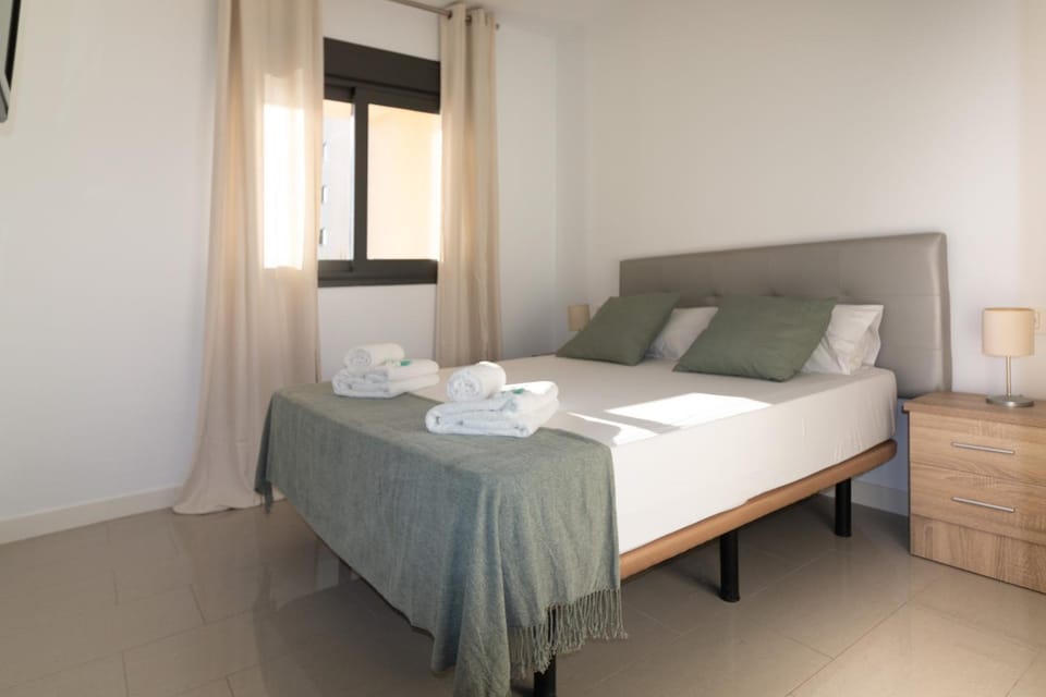 Bed, Photo of the whole room, Bedroom, towels, air conditioner