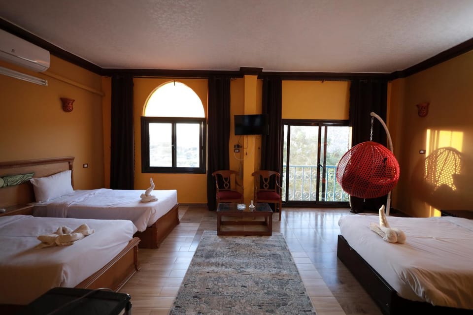Bed, Photo of the whole room, towels, air conditioner