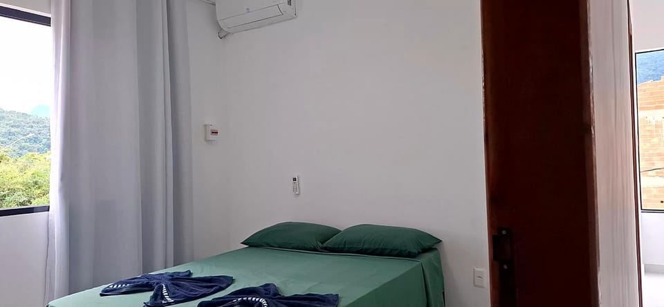 Bed, Photo of the whole room, Bedroom, towels, air conditioner