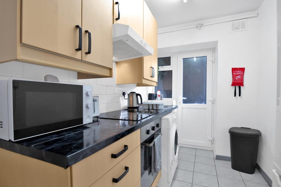 Kitchen or kitchenette, oven, stove, toaster