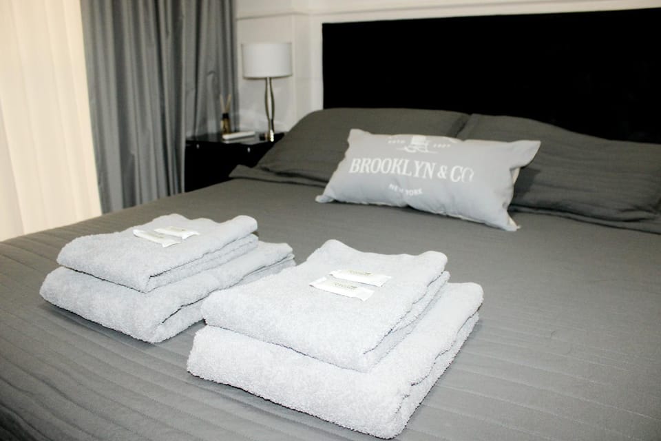 Bed, Photo of the whole room, Bedroom, towels, air conditioner