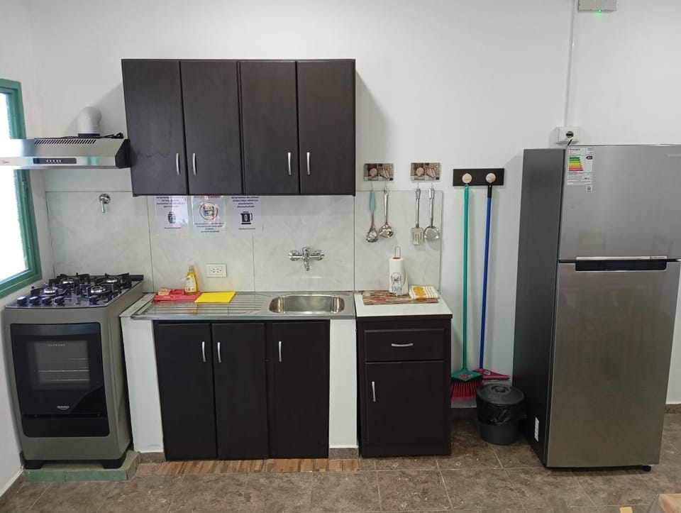 Kitchen or kitchenette, oven, stove