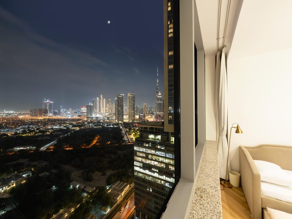 Night, View (from property/room), Living room, Seating area, City view