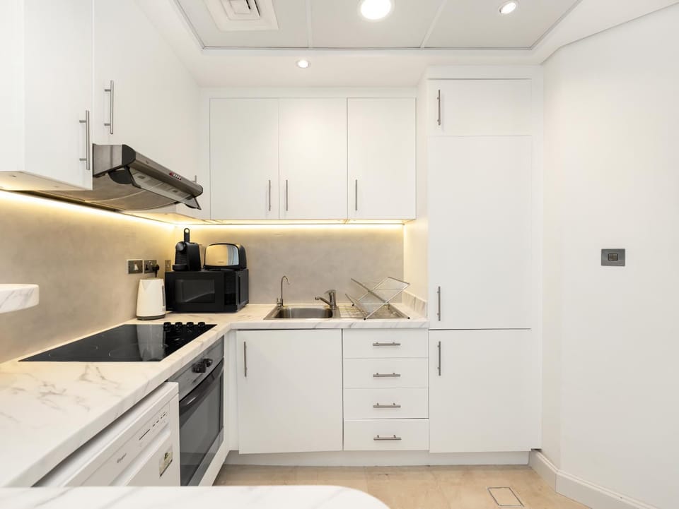 Kitchen or kitchenette, oven, stove, toaster