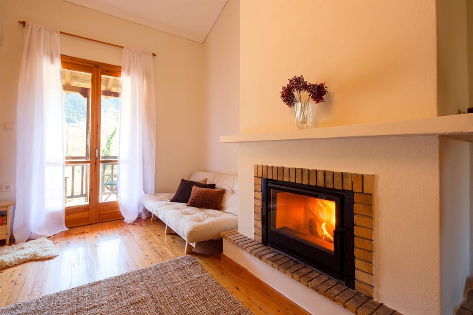 Bed, Living room, Seating area, fireplace