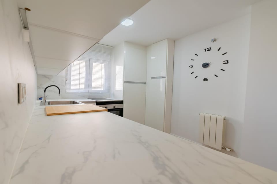 Kitchen or kitchenette, microwave, oven, washing machine