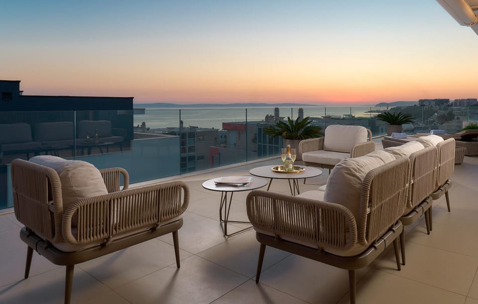 View (from property/room), Balcony/Terrace, Seating area, Sunset, sunbed