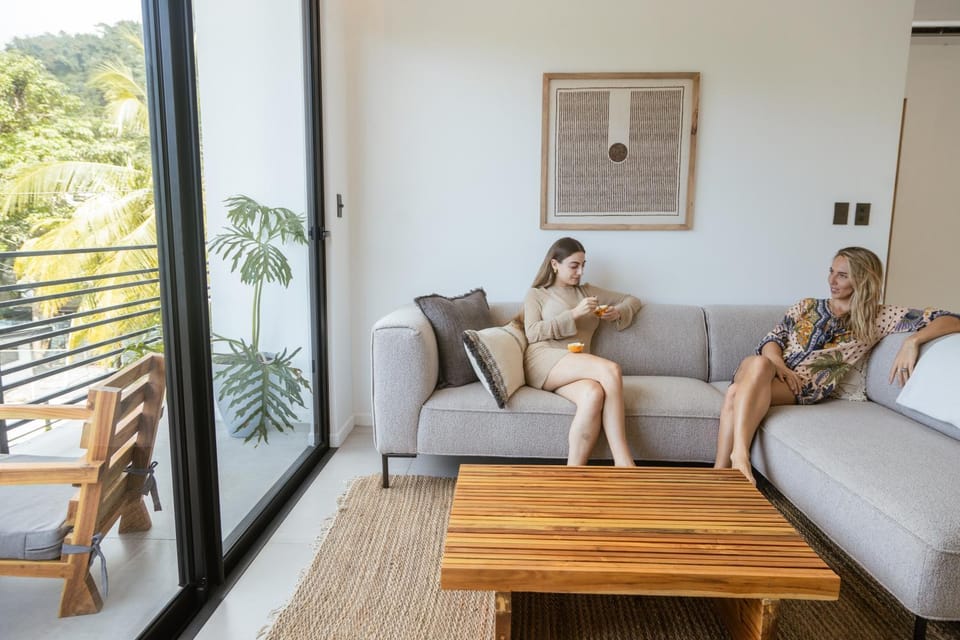People, View (from property/room), Balcony/Terrace, Living room, Seating area, Guests, group of guests