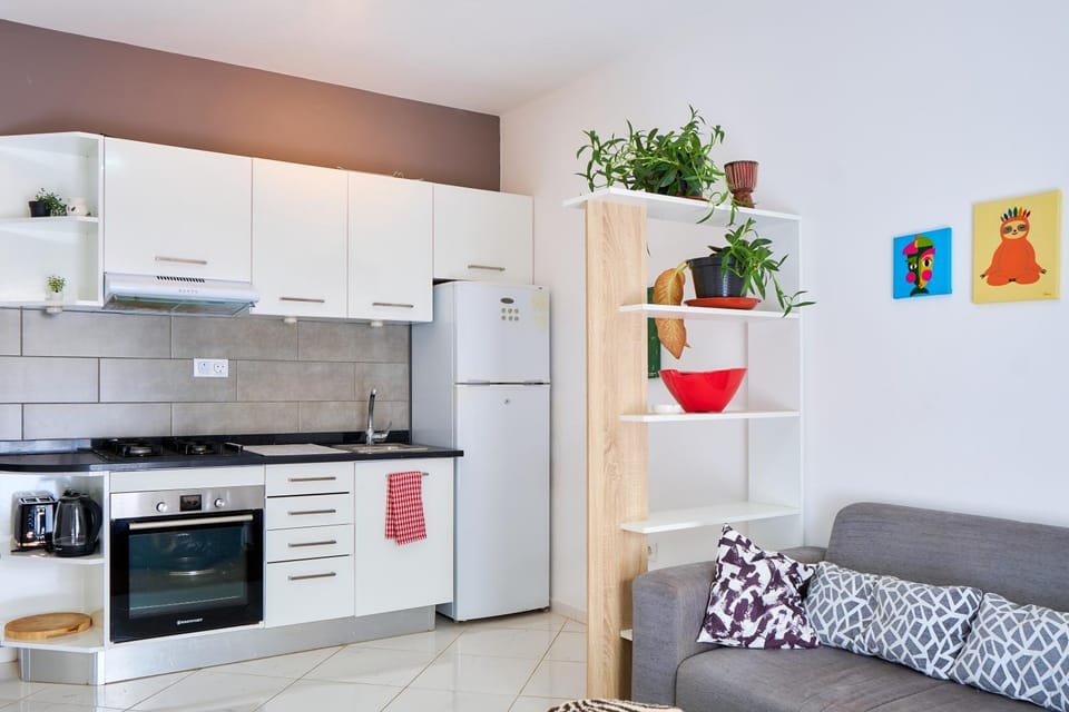 Kitchen or kitchenette, Living room, Seating area, oven, stove, toaster