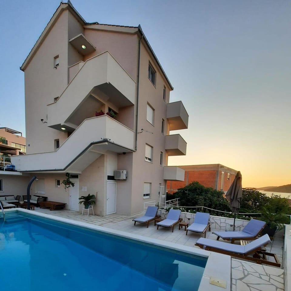 Property building, View (from property/room), Seating area, Swimming pool, sunbed