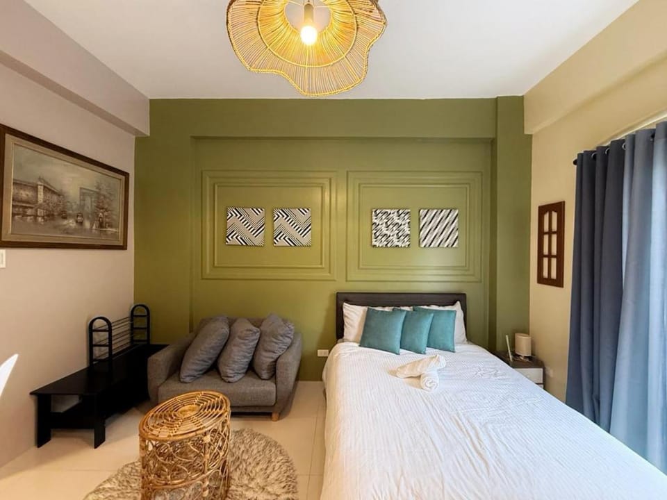 Bed, Living room, Seating area, Bedroom