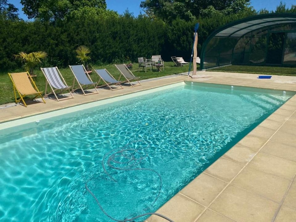 Property building, Living room, Swimming pool