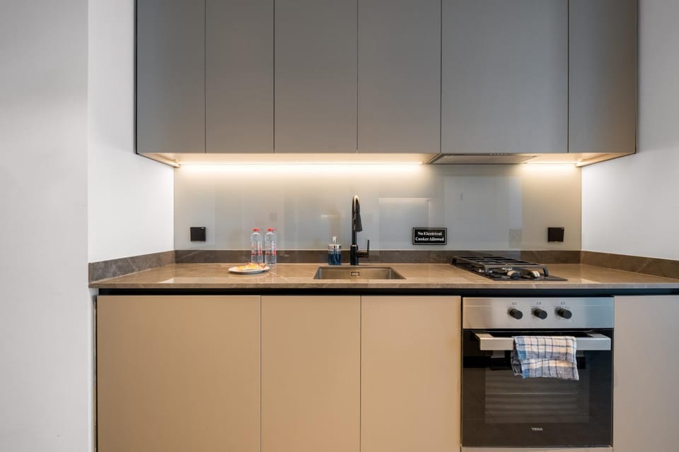 Kitchen or kitchenette, oven, stove