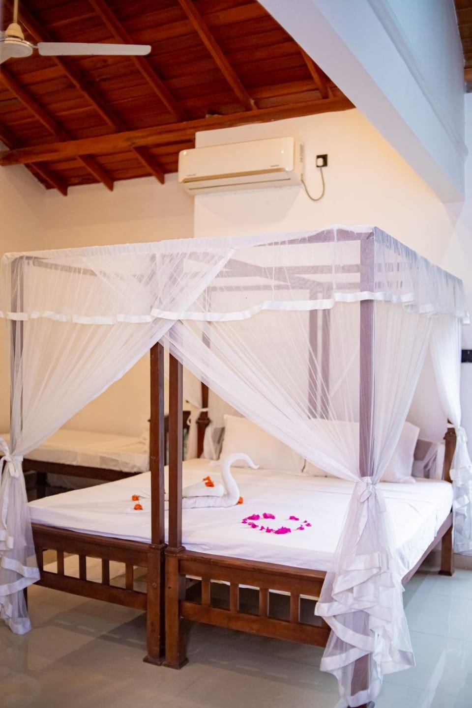Bed, Photo of the whole room, Bedroom, bunk bed, towels, air conditioner