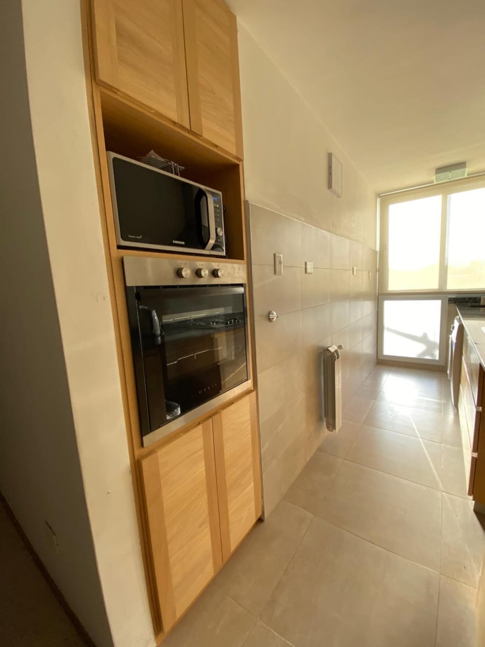 Kitchen or kitchenette, microwave, oven