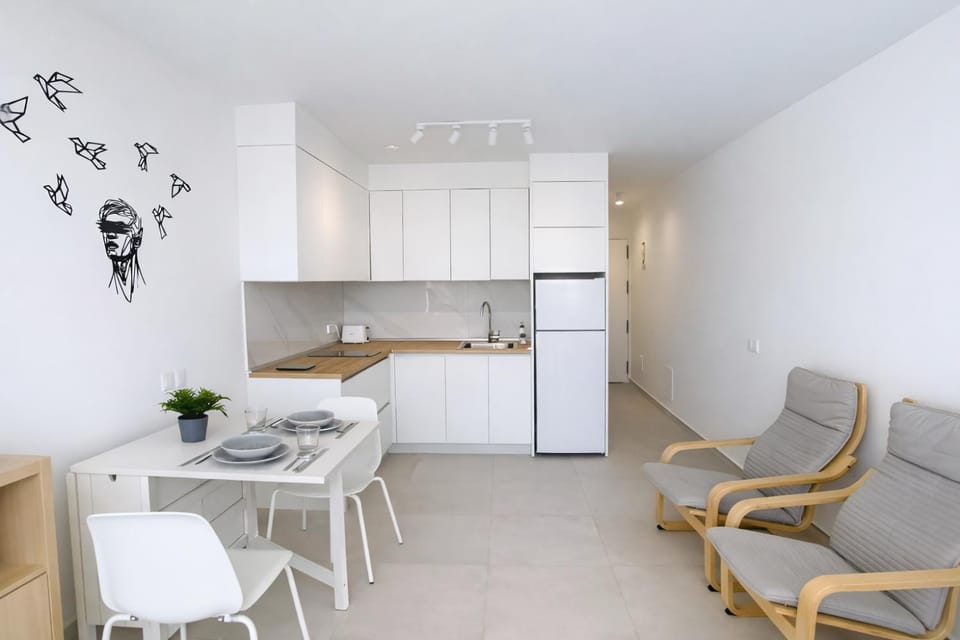 Kitchen or kitchenette, Living room, Seating area, stove, kitchen