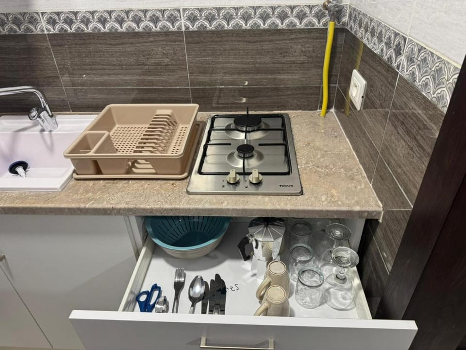 Kitchen or kitchenette, stove