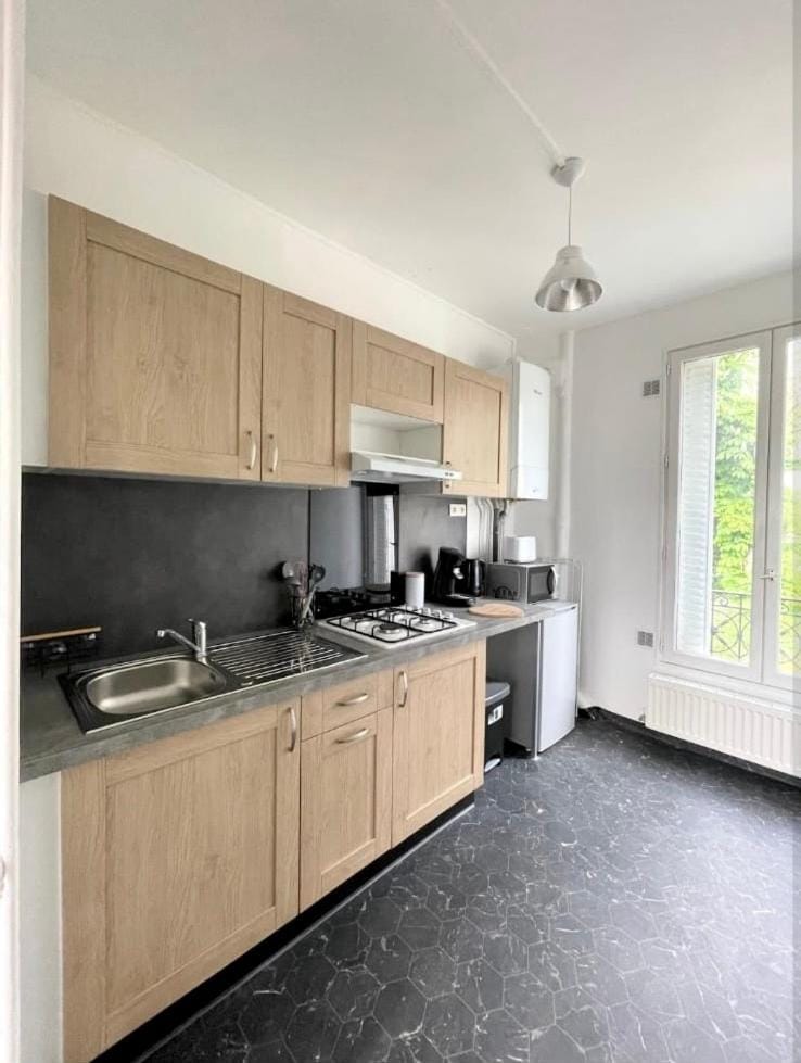 Kitchen or kitchenette, stove, toaster