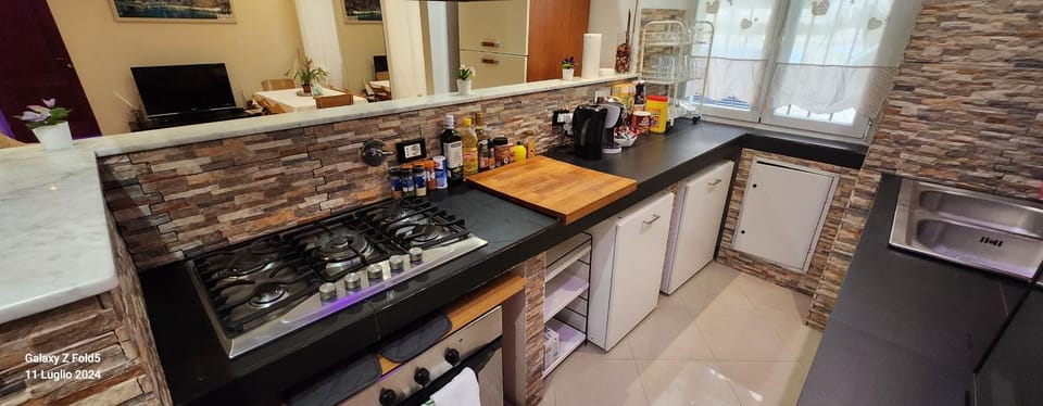 Kitchen or kitchenette, oven, stove