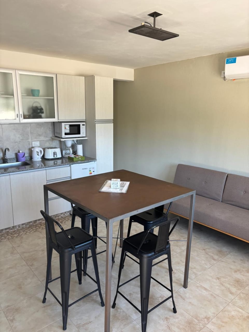 Kitchen or kitchenette, Living room, Seating area, Dining area, oven, stove, toaster