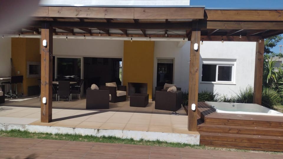Property building, Patio, Day, Seating area