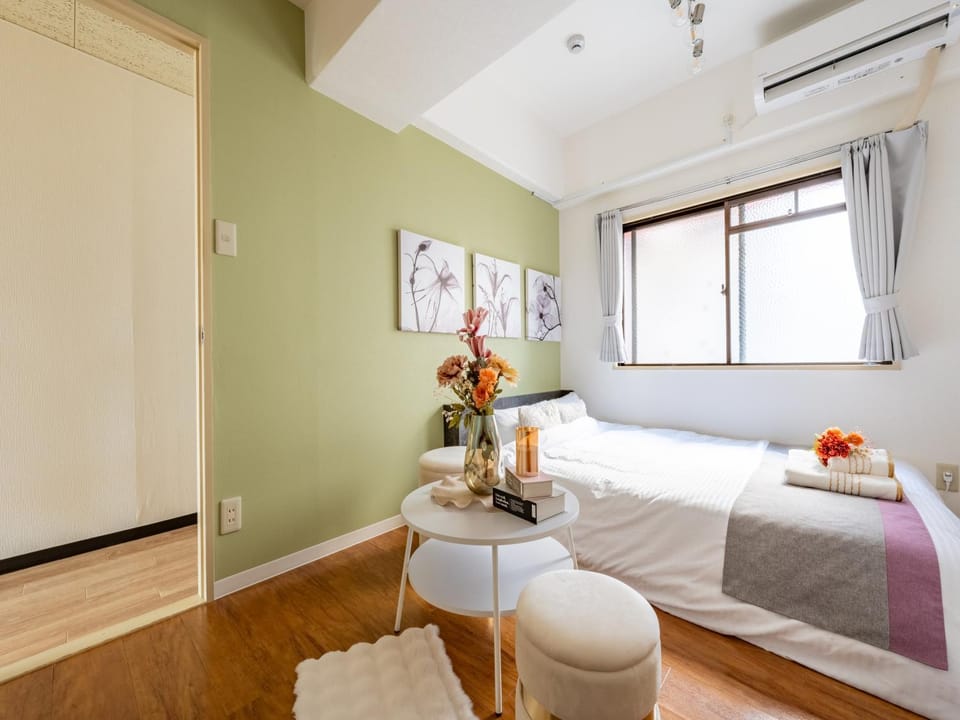 Bed, Living room, Seating area, Bedroom, air conditioner