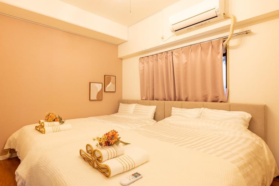 Bed, Photo of the whole room, Bedroom, towels, air conditioner