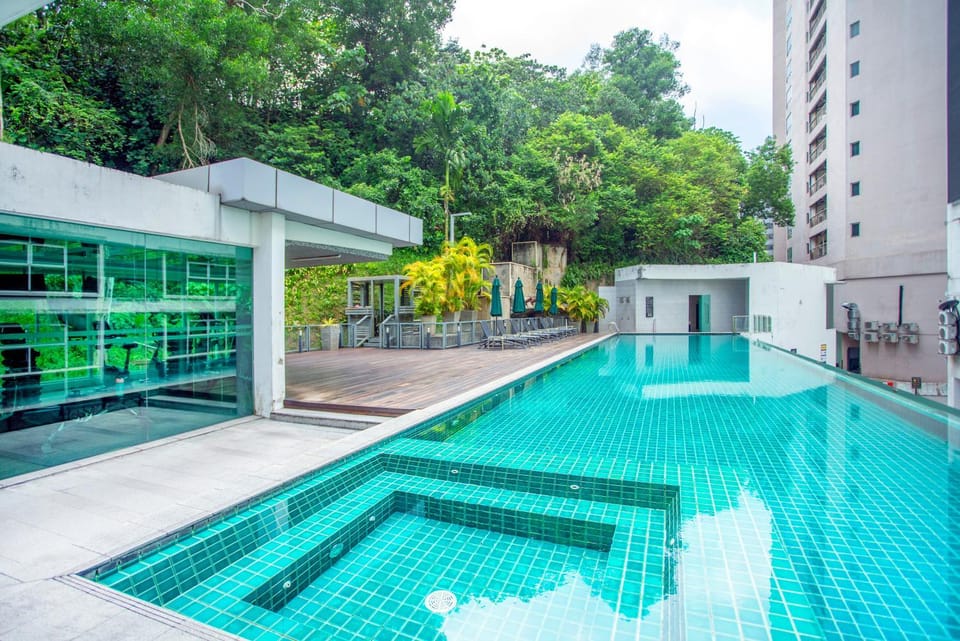 Property building, Day, Pool view, Swimming pool, sunbed
