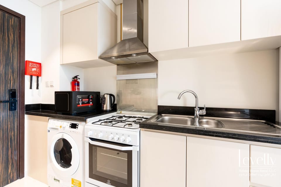 Coffee/tea facilities, Kitchen or kitchenette, dishwasher, minibar, oven, stove, toaster, washing machine